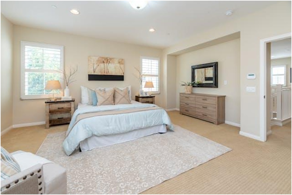 A bedroom with double bed and two nightstands